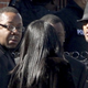 Bobby Brown (left) outside Houston's funeral (Getty)